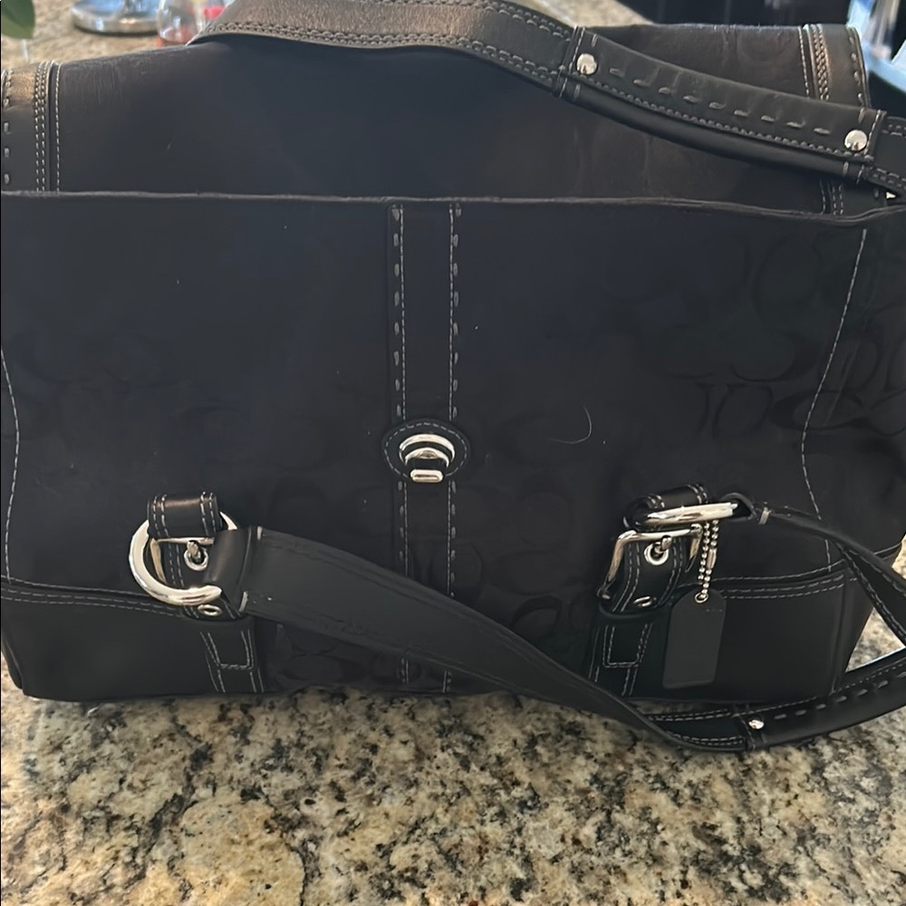 Chic Black Handbag with Silver Details
